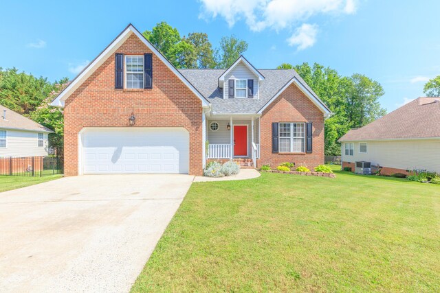 8369 Shadetree Ln, Ooltewah, TN 37363 - traditional-style home with brick siding, driveway, and central AC