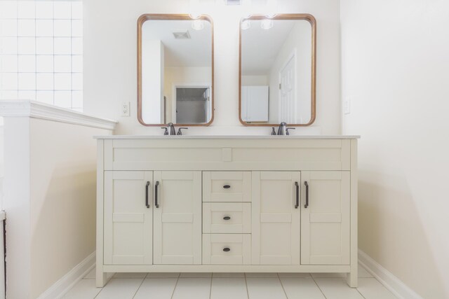 8369 Shadetree Ln, Ooltewah, TN 37363 - full bathroom featuring double vanity, baseboards, and tile patterned flooring