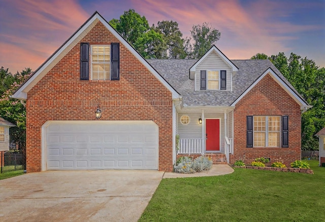 8369 Shadetree Ln, Ooltewah, TN 37363 - traditional-style house featuring driveway, brick siding, and a garage