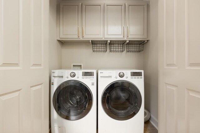 1704 Williams St, Chattanooga, TN 37408 - laundry room with independent washer and dryer, cabinet space, and baseboards