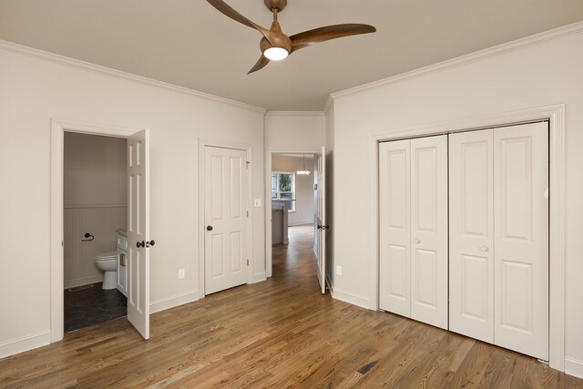 1704 Williams St, Chattanooga, TN 37408 - unfurnished bedroom featuring wood finished floors, crown molding, ensuite bath, and baseboards