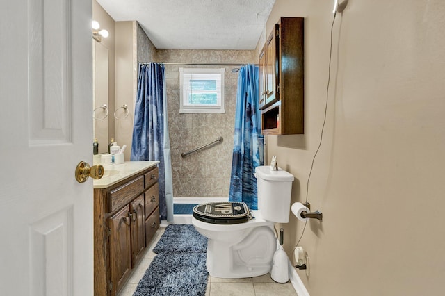 bathroom with tile patterned flooring, a stall shower, a textured ceiling, toilet, and vanity