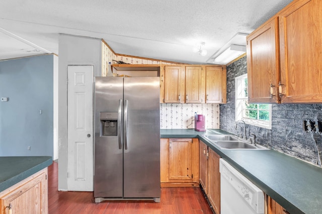 3250 Rolling Meadows Rd NW, Dalton, GA 30721 - kitchen with stainless steel refrigerator with ice dispenser, dishwasher, dark wood-style floors, vaulted ceiling, and a sink