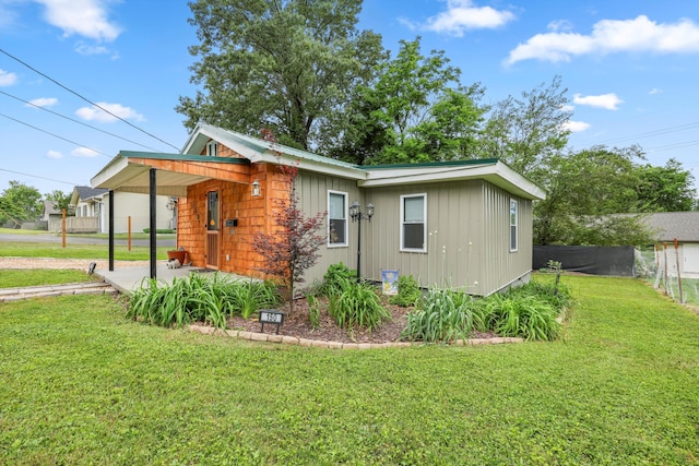 150 SE Fair St, Cleveland, TN 37311 - view of property exterior featuring board and batten siding