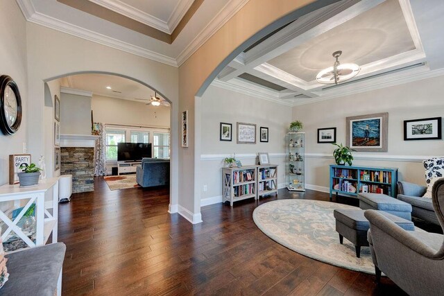 536 Live Oak Rd, Ringgold, GA 30736 - living area featuring arched walkways, hardwood / wood-style floors, a chandelier, crown molding, and a ceiling fan