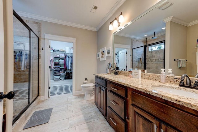 536 Live Oak Rd, Ringgold, GA 30736 - full bath with a shower stall, double vanity, crown molding, a walk in closet, and toilet