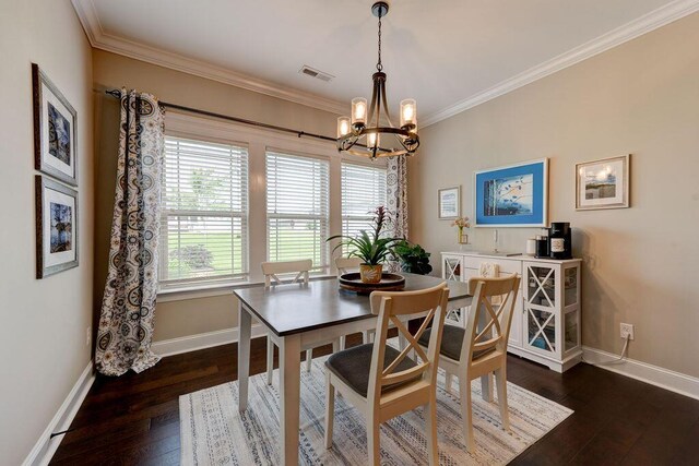 536 Live Oak Rd, Ringgold, GA 30736 - dining space featuring a chandelier, dark wood-style flooring, baseboards, and ornamental molding