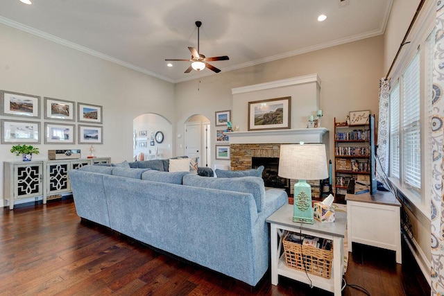 536 Live Oak Rd, Ringgold, GA 30736 - living area with arched walkways, a stone fireplace, dark wood-style flooring, a ceiling fan, and recessed lighting