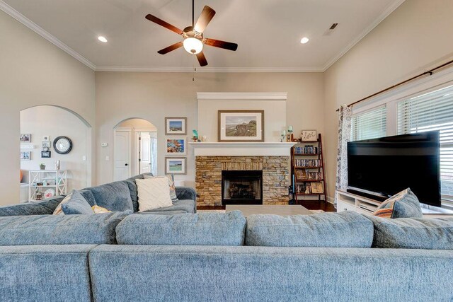 536 Live Oak Rd, Ringgold, GA 30736 - living area featuring arched walkways, ceiling fan, ornamental molding, a fireplace, and recessed lighting