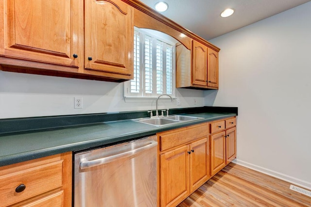 5040 Dellwood Dr, Rossville, GA 30741 - kitchen featuring dishwasher, a sink, dark countertops, light wood finished floors, and baseboards