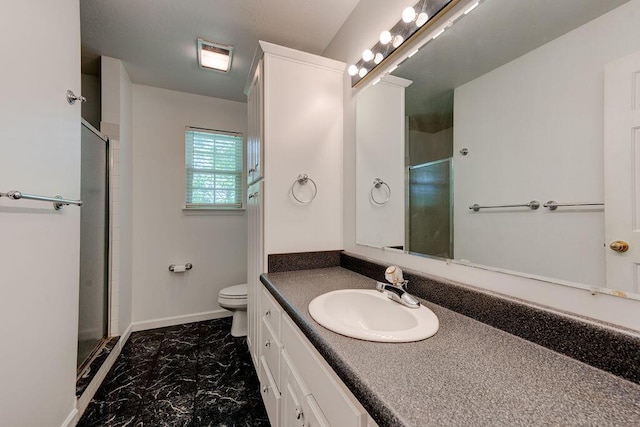 5040 Dellwood Dr, Rossville, GA 30741 - bathroom with marble look tile flooring, a shower stall, toilet, vanity, and baseboards