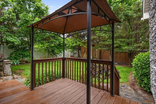 wooden terrace with a gazebo