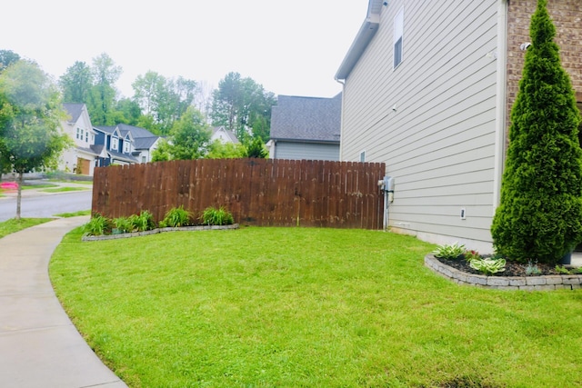 view of yard with a residential view