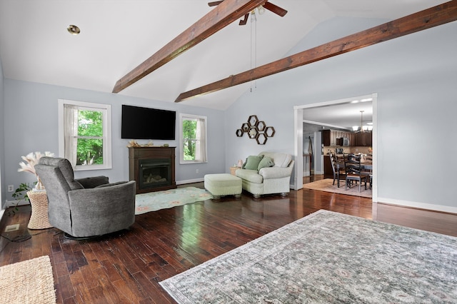 15033 Log Cabin Ln, Soddy Daisy, TN 37379 - living area featuring a fireplace, wood finished floors, beam ceiling, baseboards, and ceiling fan