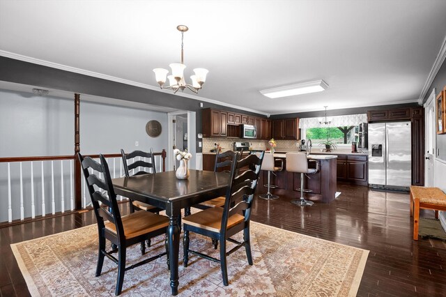 15033 Log Cabin Ln, Soddy Daisy, TN 37379 - dining room with a chandelier, ornamental molding, and dark wood-style floors