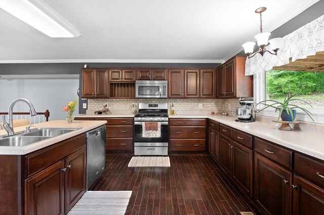 15033 Log Cabin Ln, Soddy Daisy, TN 37379 - kitchen featuring appliances with stainless steel finishes, a sink, a chandelier, light countertops, and crown molding
