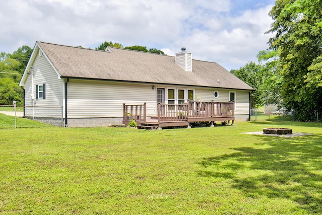 8820 Forest Pond Dr, Harrison, TN 37341 - back of house with a fire pit, a deck, a chimney, and roof with shingles