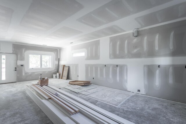 1204 Buckley St, Chattanooga, TN 37404 - spare room featuring unfinished concrete flooring