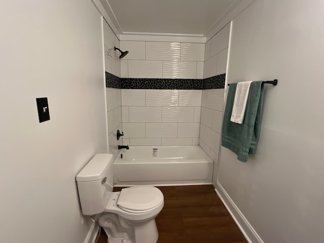560 8th St NE, Cleveland, TN 37311 - full bathroom featuring toilet, wood finished floors, baseboards, and shower / tub combination