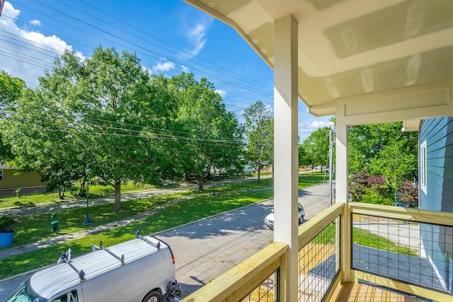 1314 Buckley St, Chattanooga, TN 37404 - wooden porch with view of wooded area and a yard