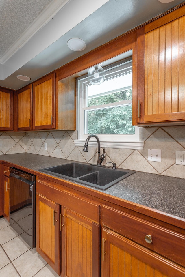 7429 Irongate Dr, Hixson, TN 37343 - kitchen with black dishwasher, a sink, brown cabinetry, backsplash, and crown molding