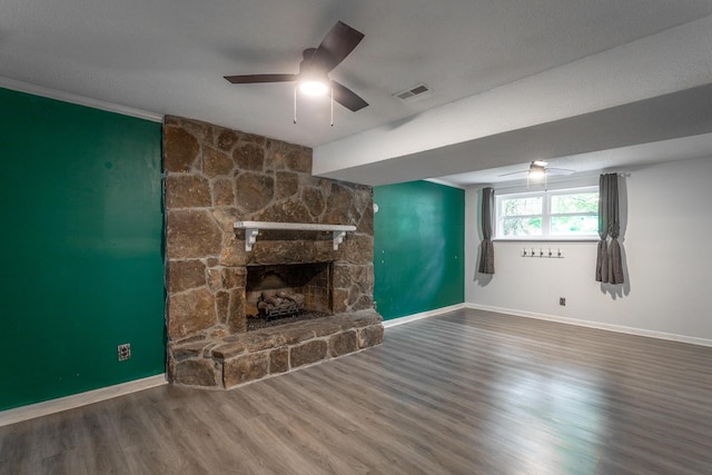 7429 Irongate Dr, Hixson, TN 37343 - unfurnished living room featuring ceiling fan, baseboards, wood finished floors, and a fireplace