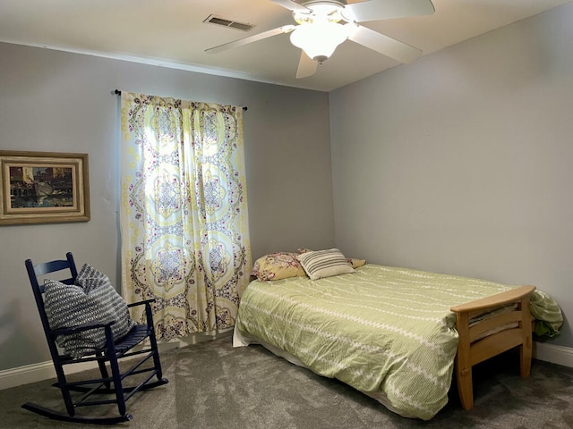 bedroom featuring carpet floors, baseboards, and a ceiling fan