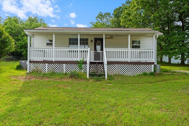 single story home with covered porch and a front lawn