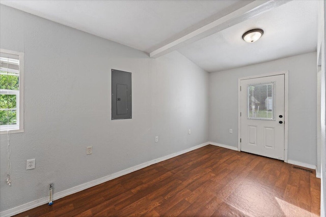 unfurnished room with electric panel, dark wood-type flooring, baseboards, and beam ceiling