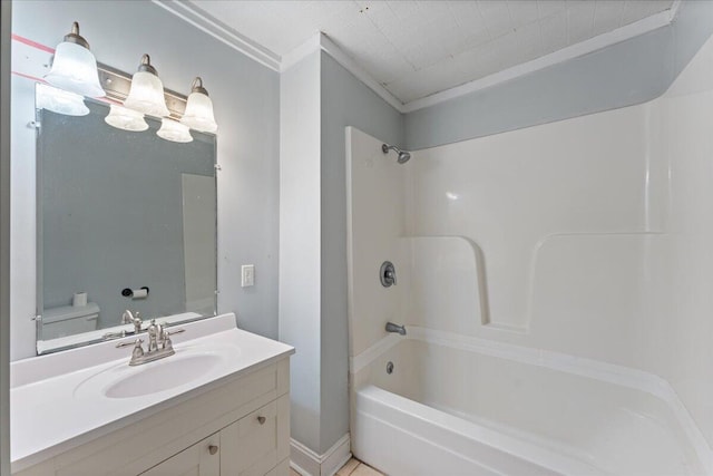 full bath with ornamental molding, tub / shower combination, toilet, and vanity
