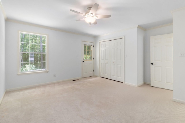 1623 Devlan Forest Ln, Signal Mountain, TN 37377 - unfurnished bedroom featuring ornamental molding, carpet floors, multiple windows, and a closet