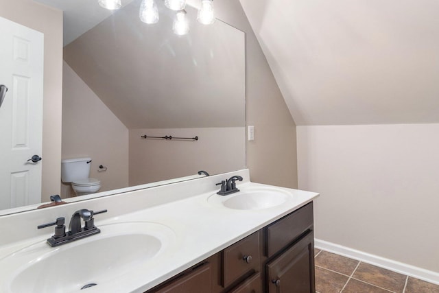 1623 Devlan Forest Ln, Signal Mountain, TN 37377 - bathroom featuring lofted ceiling, double vanity, and tile patterned floors