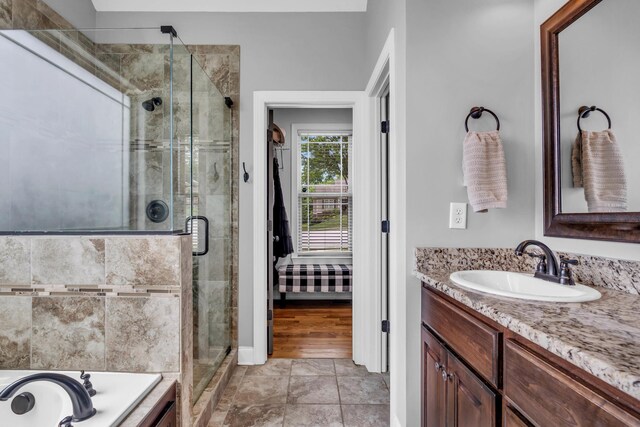 7983 Chianti Way, Chattanooga, TN 37421 - bathroom featuring vanity, a stall shower, and a tub