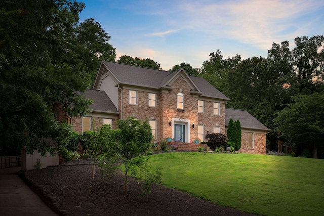 9416 Royal Mountain Dr, Chattanooga, TN 37421 - view of front of property featuring a front yard, brick siding, and a shingled roof
