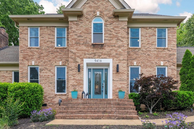 9416 Royal Mountain Dr, Chattanooga, TN 37421 - view of front of home featuring brick siding and a shingled roof