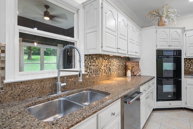 9416 Royal Mountain Dr, Chattanooga, TN 37421 - kitchen featuring a sink, dishwasher, dark stone counters, backsplash, and white cabinets