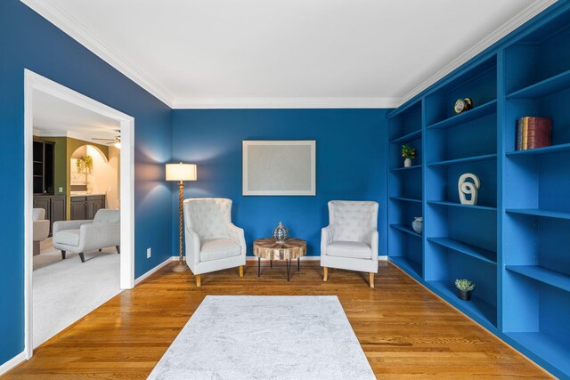 9416 Royal Mountain Dr, Chattanooga, TN 37421 - living area featuring crown molding, a ceiling fan, baseboards, and wood finished floors