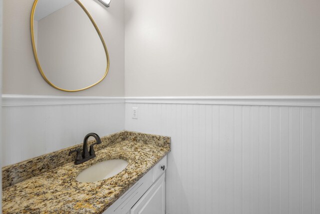 9416 Royal Mountain Dr, Chattanooga, TN 37421 - bathroom with a wainscoted wall and vanity