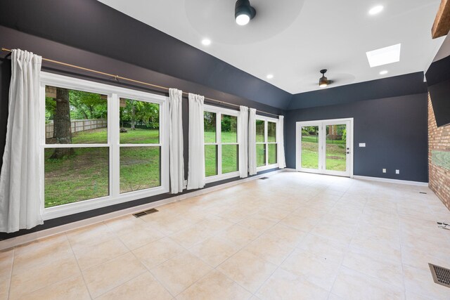 9416 Royal Mountain Dr, Chattanooga, TN 37421 - unfurnished room featuring ceiling fan, a skylight, light tile patterned floors, lofted ceiling, and baseboards