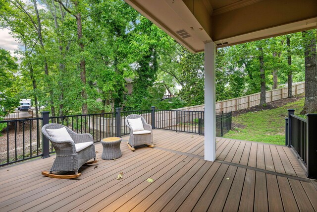 9416 Royal Mountain Dr, Chattanooga, TN 37421 - deck featuring fence and view of wooded area