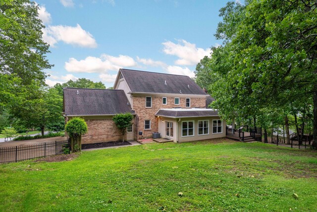 9416 Royal Mountain Dr, Chattanooga, TN 37421 - rear view of property featuring a wooden deck and a shingled roof