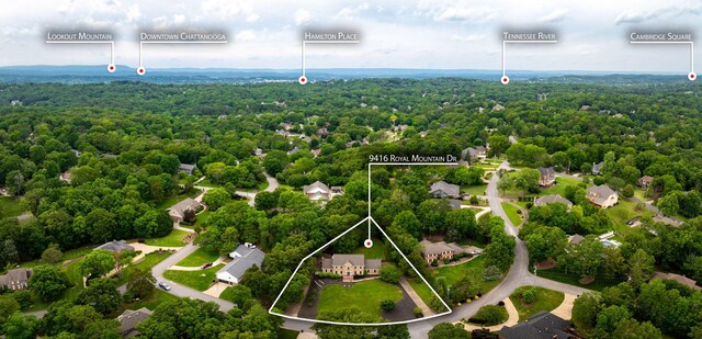 9416 Royal Mountain Dr, Chattanooga, TN 37421 - aerial perspective of suburban area with a heavily wooded area and property parcel outlined