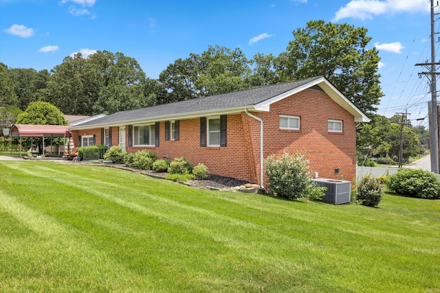 3502 Oak Ridge Dr, Chattanooga, TN 37415 - ranch-style home featuring brick siding, a carport, and a front yard
