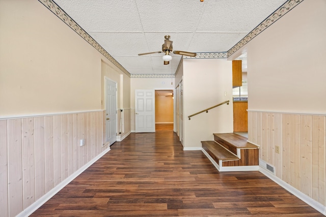 3502 Oak Ridge Dr, Chattanooga, TN 37415 - corridor with wood walls, wood finished floors, a wainscoted wall, and stairs