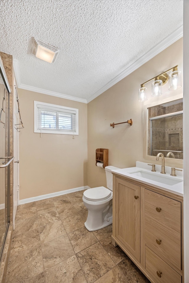 3502 Oak Ridge Dr, Chattanooga, TN 37415 - bathroom featuring ornamental molding, a shower stall, vanity, and a textured ceiling