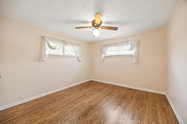 3502 Oak Ridge Dr, Chattanooga, TN 37415 - unfurnished room featuring a ceiling fan and wood finished floors