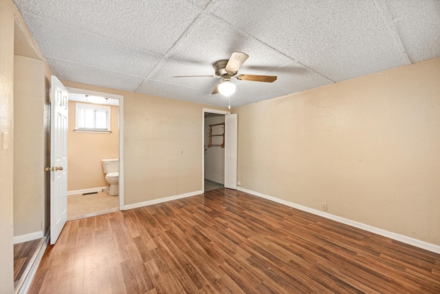 3502 Oak Ridge Dr, Chattanooga, TN 37415 - unfurnished bedroom featuring wood finished floors, ceiling fan, connected bathroom, and a closet