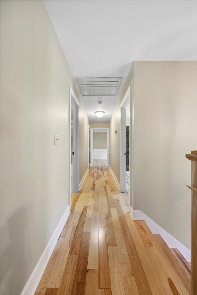 7470 Twin Brook Dr, Chattanooga, TN 37421 - hall featuring light wood-type flooring, baseboards, and attic access