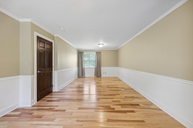 7470 Twin Brook Dr, Chattanooga, TN 37421 - unfurnished room with light wood finished floors, a wainscoted wall, and crown molding