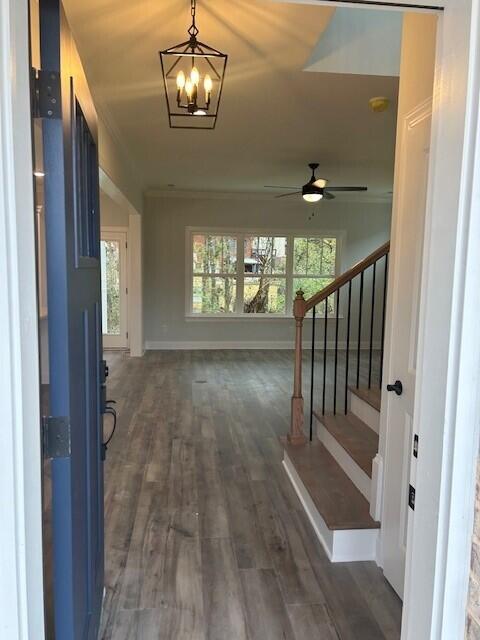 8860 Knolling Loop Unit 37, Ooltewah, TN 37363 - corridor featuring stairway, dark wood finished floors, baseboards, and a chandelier